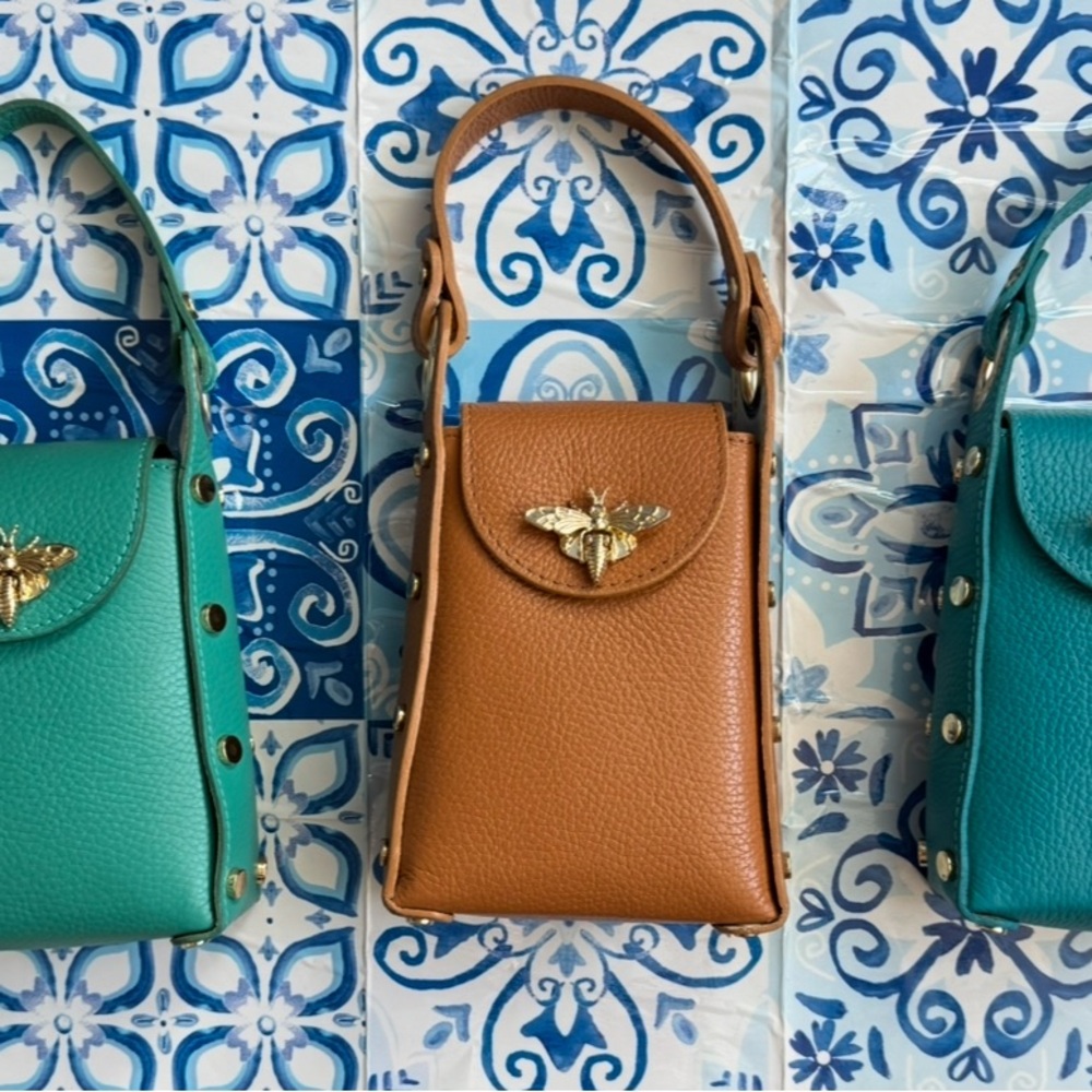 Leather Clutches,  Structured Design and a bee clasp (specify teal, tan or blue)